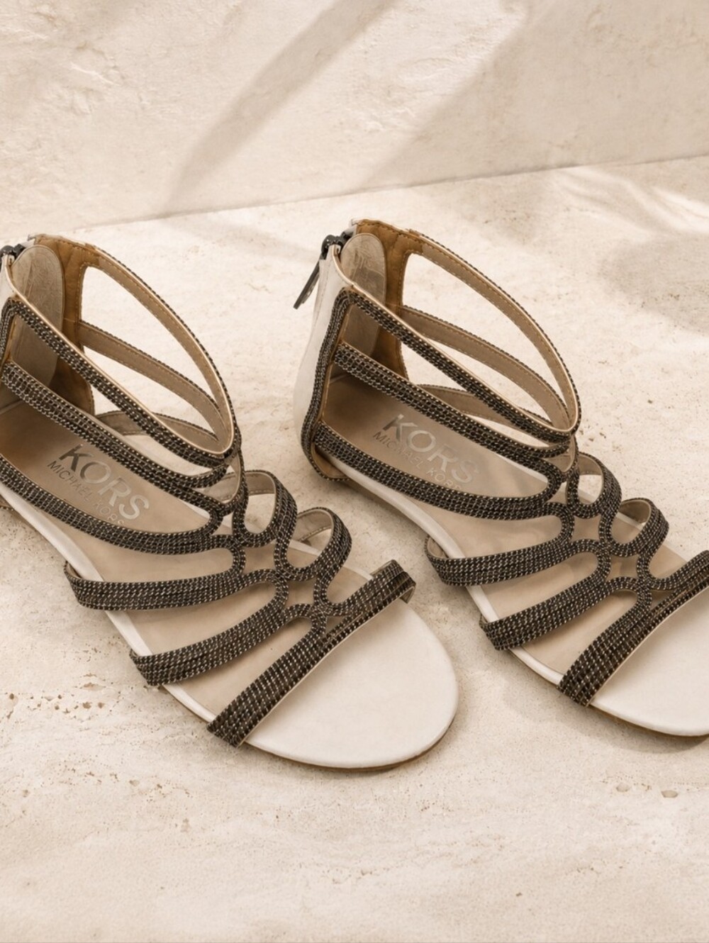 Michael Kors chain-embellished sandals.
